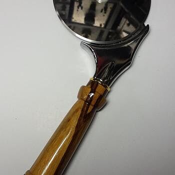 4 in. Deluxe Stainless Steel Pizza Cutter Kit Heavy duty, but don't use a 1/2" drill bit.
