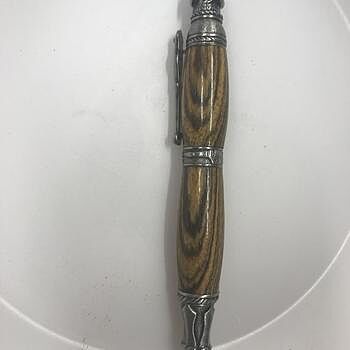 7mm Pen Kit Bundle: 8 Pen Kits and 3 sets of FREE Bushings and one 10 pack of Cocobolo Blanks I just started turning about