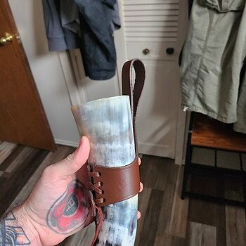 Adjustable Belt Holster It's leather, it's adjustable, your horns going no where