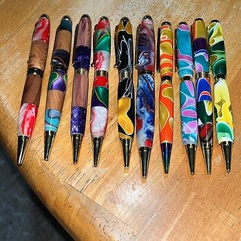 7mm Pen Kit Bundle: 8 Pen Kits and 3 sets of FREE Bushings and one 10 pack of Cocobolo Blanks Love making the pens