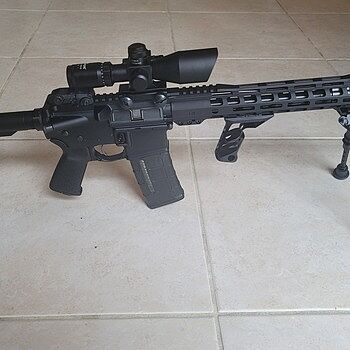 PSA AR-15 16" Mid-Length 5.56 NATO 1/7 Nitride 13.5" Lightweight M-Lok MOE EPT Rifle w/MBUS Sight Set Amazing rifle!!!! Love it