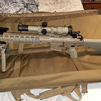 PSA Sabre AR-10 Rifle Billet 20" .308 Rifle w/ 12.5" Quad Rail, A1 Stock, Magpul Bi-Pod, 3 Mags, & Sabre Bag, FDE It’s great! Runs smoothly right