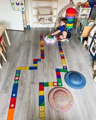 Early Technology Light Up Glow and Go Bot