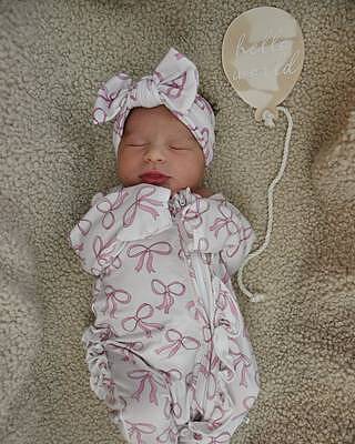 Blushing Bows Ruffle Zipper Footie