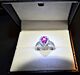 Pink sapphire and diamond ring