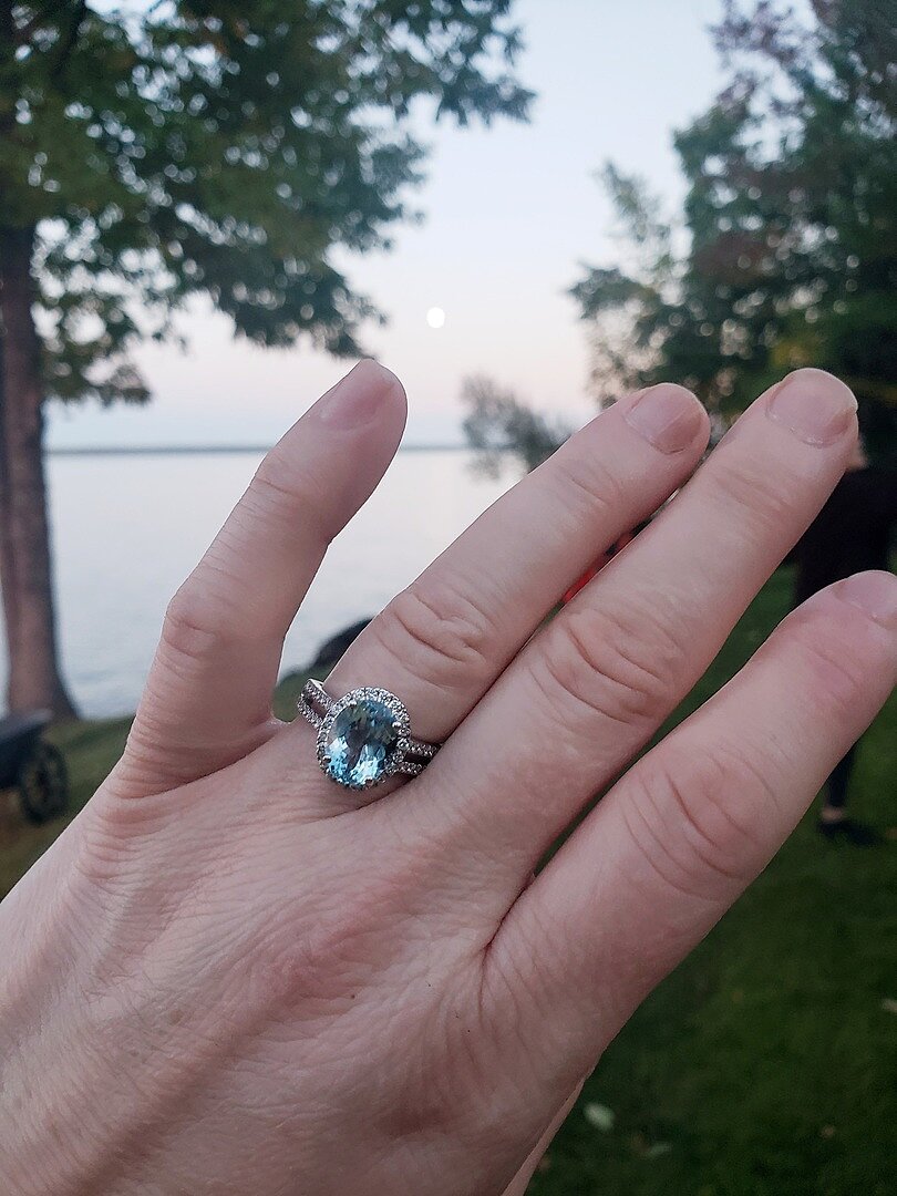 Oval Aquamarine Split Shank Halo Ring with Diamonds