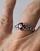 Celtic knot with garnet