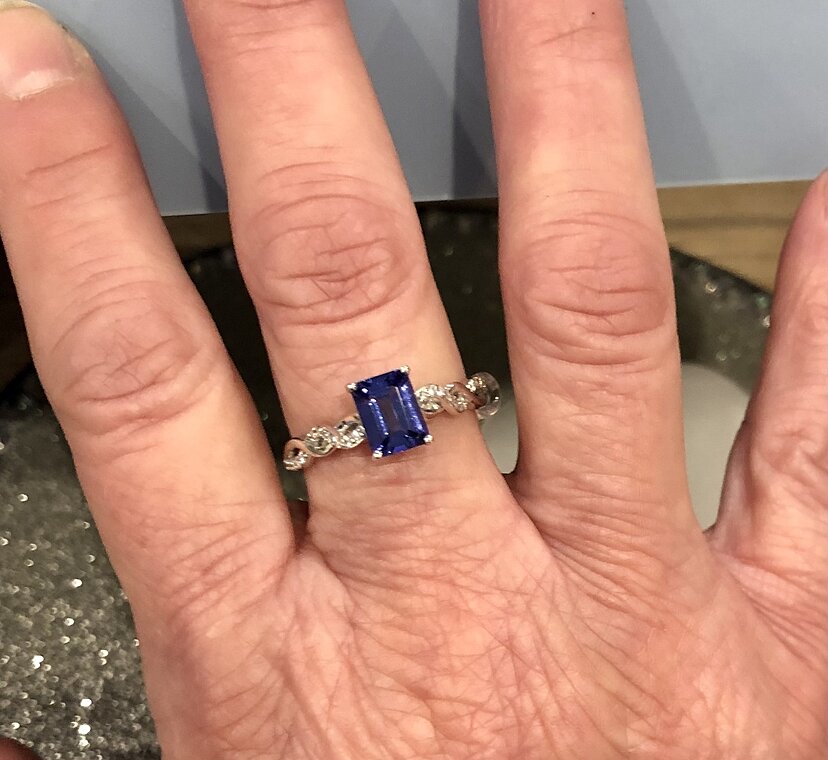 Emerald-Cut Solitaire Tanzanite Infinity Twist Engagement Ring