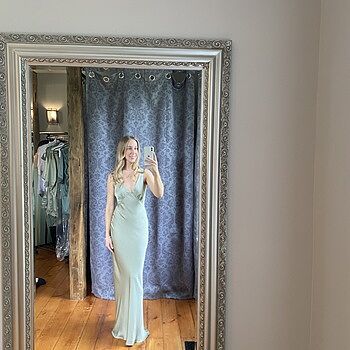 park and fifth dresses Gracey Dress | True Sage Satin Long Bridesmaid Dress (Size M) | Lined | Open Back | 100% Recycled Fabric Thick straps Bias cut dress Plunging neckline Full length Fully self lined Open back with tie detail Model is 58 wearing a Size S Park + Fifth || The