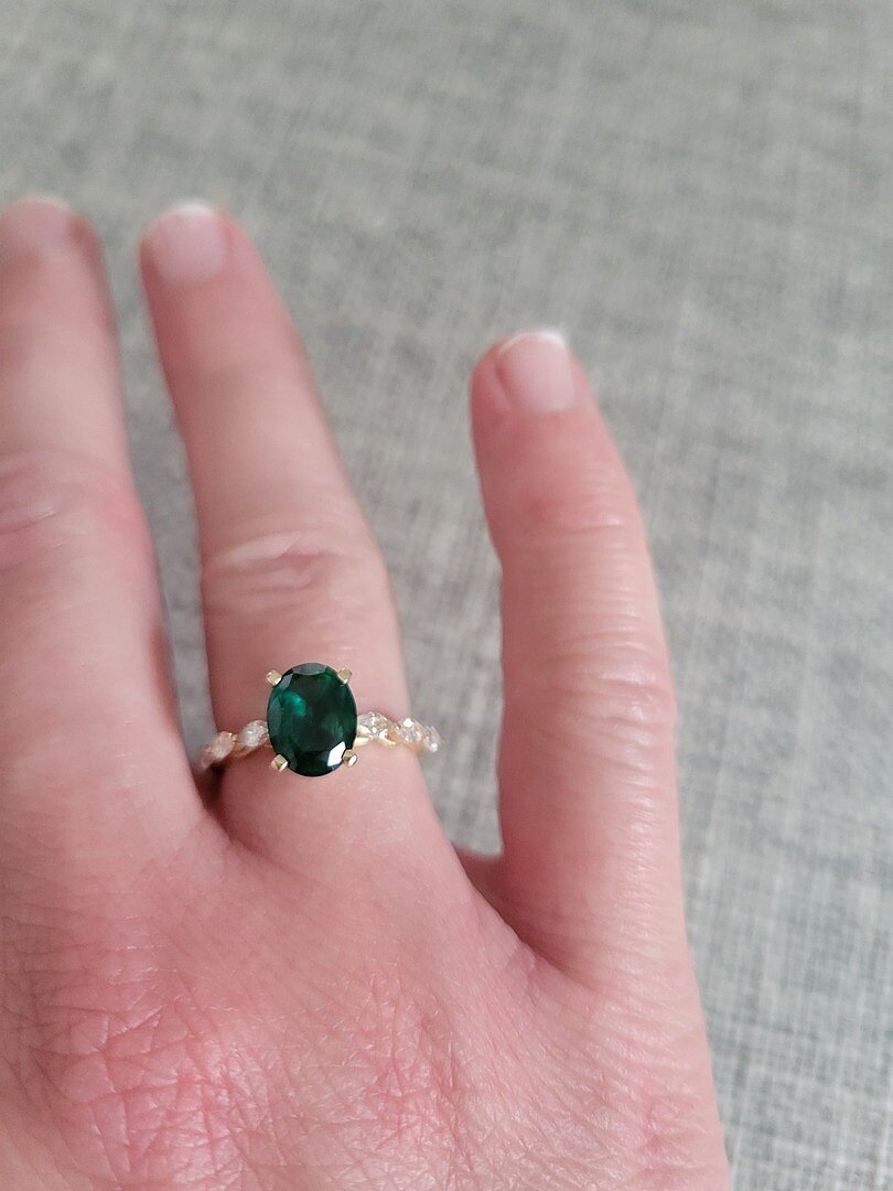 Oval Emerald Engagement Ring with Marquise Diamonds
