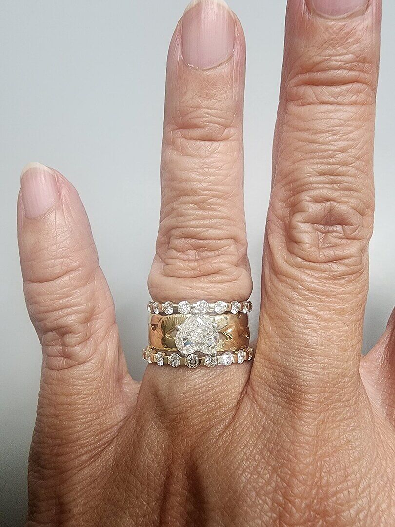 Floating diamond semi eternity band