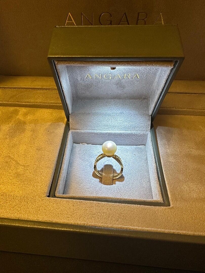 Pearl 10mm infinity diamond ring for my wife.