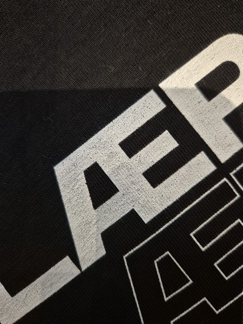 Dårlig kvalitet print og tynd t shirt