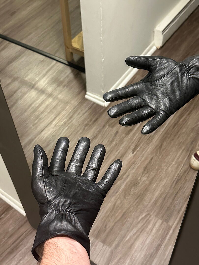 Black Giovanni gloves shown on both hands