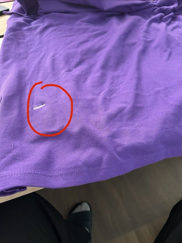 Klebereste auf Rückseite