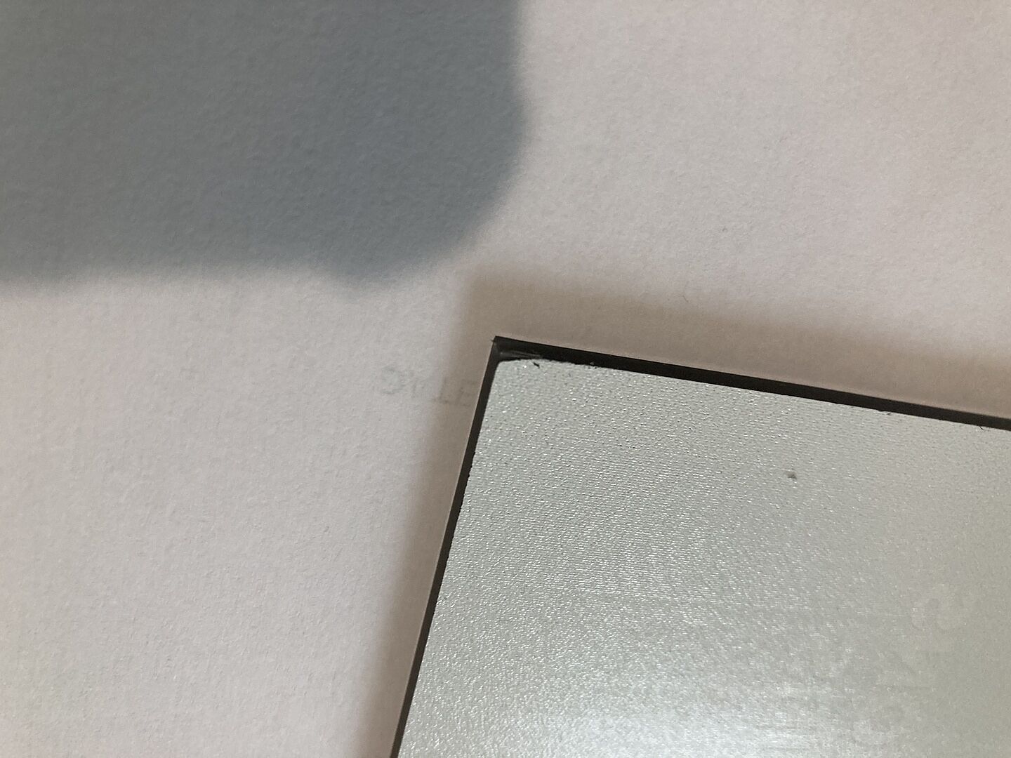 Défaut aux angles inférieurs