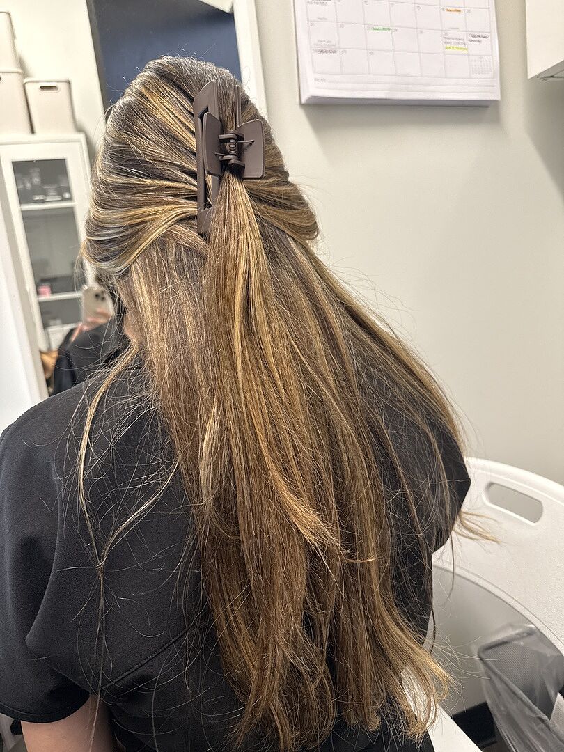 Alana's hair in a claw clip