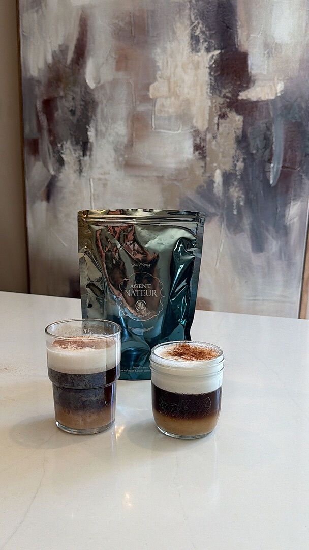Two lattes made with holi (mane), next to the bag