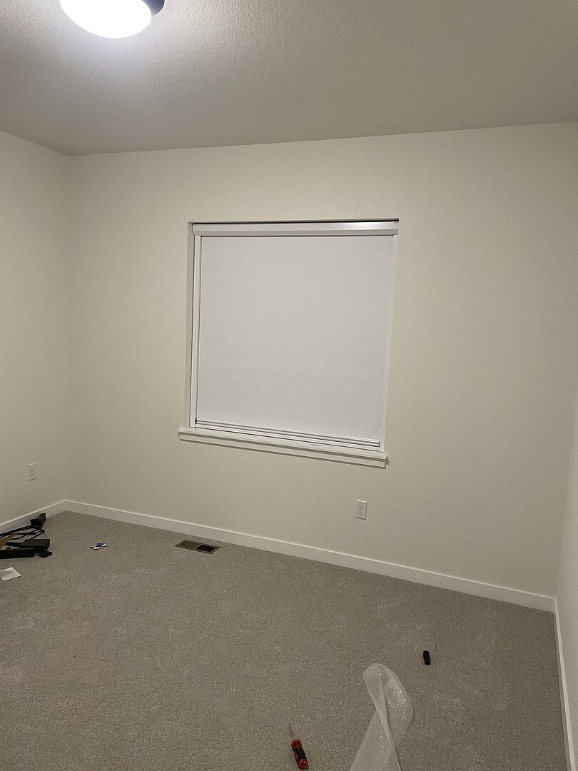 Ultimate Blackout Shade fitted in a customer's window — photo from Kevin W.'s review
