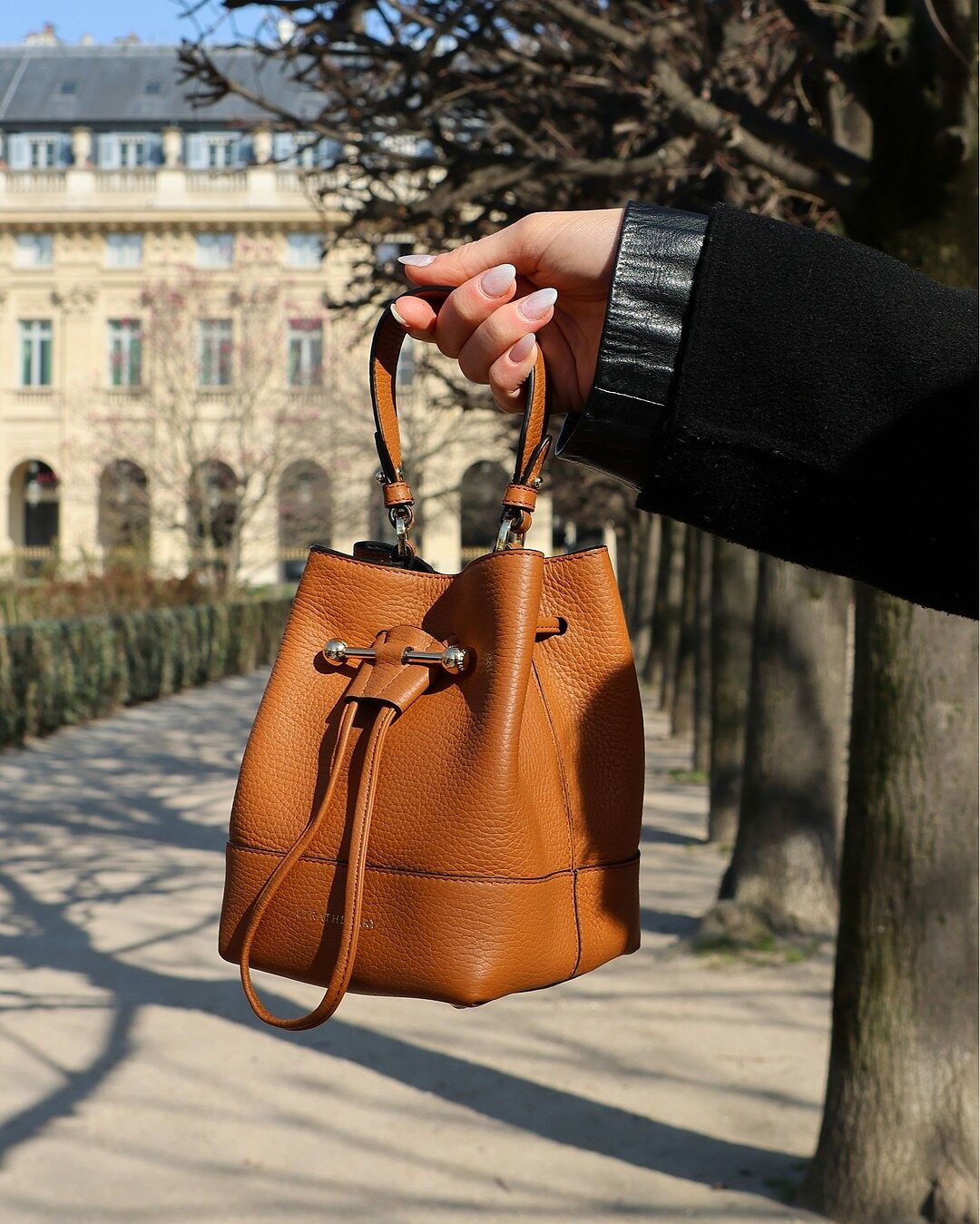 Sunday stroll with Strathberry. The Lana Osette is the perfect addition to your summer wardrobe 🧡 #strathberry