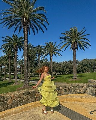 Shop the Giavana Strapless Layered Ruffles Midi Dress Lemon
