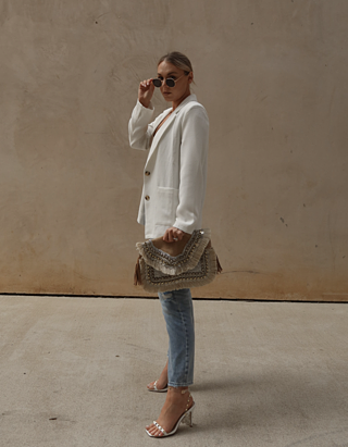 leela clutch in natural